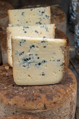 Pieces of tasty Blue Basque Fume smoked sheep cheese produced in south-western France, Northern Basque Country