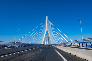 View on cable-stayed bridge with high pylons across the Bay of Cadiz, linking Cadiz with Puerto Real in mainland Spain