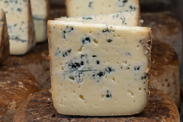 Pieces of tasty Blue Basque Fume smoked sheep cheese produced in south-western France, Northern Basque Country