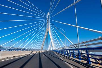 View on cable-stayed bridge with high pylons across the Bay of Cadiz, linking Cadiz with Puerto Real in mainland Spain