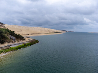 Panoramic view on Arcachon Bay, near Passe Sud, Bank d'Argun, Dune du Pilat and Cap Ferret, on rainy winter day, tourist destination on Atlantic ocean, France