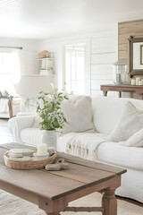A gorgeous farmhouse style living room with subtle pops of color in the decor. 3D render.
