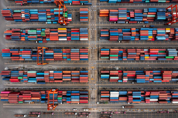 shipping container warehouse stacking in a row working by forkliff and crane for ditributing to...