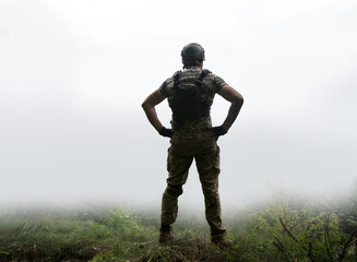 Sad soldier look to the sky