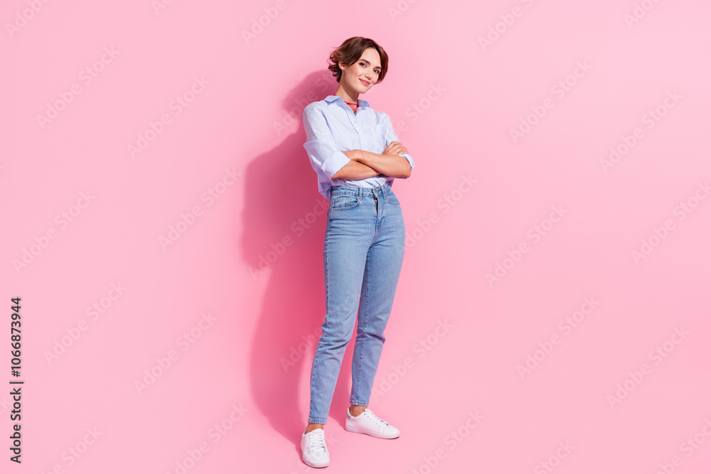 Poster full size portrait of pretty lovely girl crossed arms posing empty space advert isolated on pink col