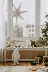 Elegant holiday decor with a mix of gold, green, and natural textures. A serene and stylish celebration of the season.