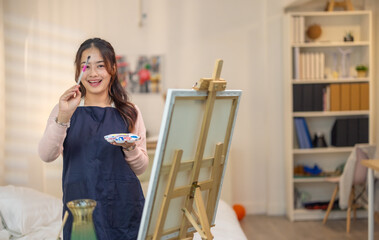 Woman Painting at Home Studio