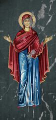 Fototapeta premium Traditional Christian icon of the Blessed Virgin Mary. Antique illustration on cracked wall in Byzantine style