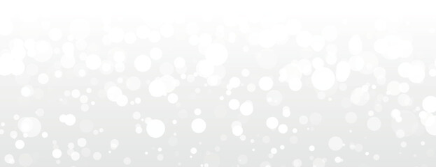 White background with a bokeh style, featuring soft, blurred circles. The background is light and airy, with a smooth white texture. Dreamy bokeh light background vector