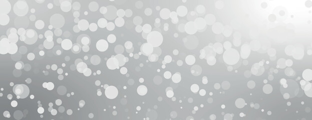 A soft gray background with a bokeh style. The background features light gray circles, creating a dreamy, textured background effect. Dreamy bokeh light background vector