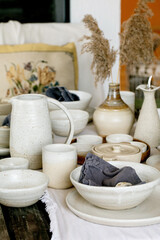 Rustic table setting with empty craft handmade ceramic tableware