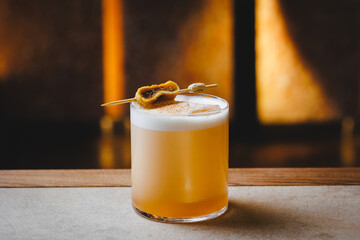 Classic cocktail Ammareto sour on the bar counter. Without people