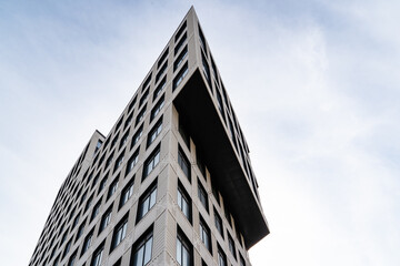 Modern Urban Architecture Showcased Among Tall Buildings Beneath a Blue Sky