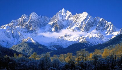Fototapeta premium Majestic peaks at Glacier National Park with autumn foliage and clear blue skies