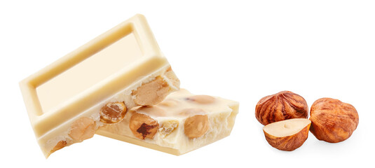 Broken white chocolate bar with hazelnuts isolated on white background. Delicious white chocolate in a stack closeup.