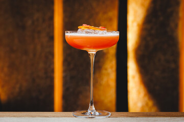 Chic serving of cocktails at the bar, Brandy, whiskey, apricot, orange.