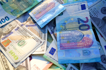 Money background. Dollar and Euro Banknotes. Euro cash payment. USA money and European Union bills. Economic US dollars Euro. Bills for pension and salary. Euro, 100 Dollar background. American money.