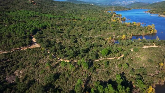 Wide drone view of kayaks on the Lake of Saint-Cassien