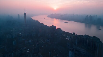 Fototapeta premium Aerial View of Wuhan Cityscape with Yellow Crane Tower and Yangtze River at Sunset