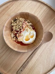 Yogurt honey with happiness on the wood table.