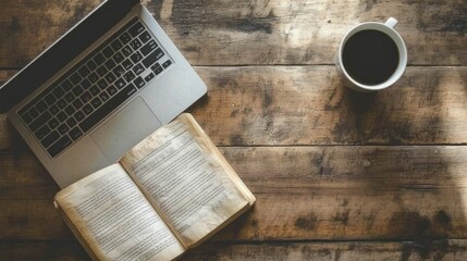 A cup of coffee on the table with a pile of open books