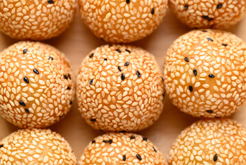 Sesame ball, Fried glutinous rice flour coated with sesame seeds and filled with mung bean, red bean paste or sweet coconut