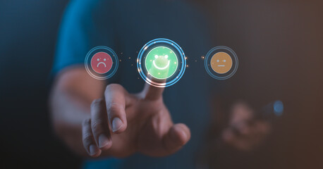 Businessman using smartphone pushing smile green button for the best evaluation, customer satisfaction concept. Give feedback icon satisfaction survey, evaluation, review, feedback, service excellent