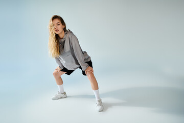 A skilled athlete embodies passion and focus, striking a powerful pose that showcases her talent.