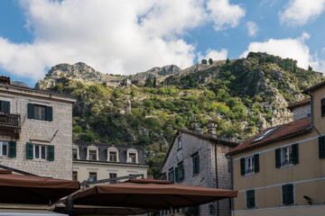 Walls of the Kotor Fortress with mountains and blue sky, Montenegro