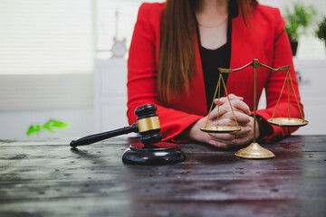 A dedicated Asian female lawyer who reviews legal documents and handles complex cases with expertise. Her professionalism and commitment reflect her commitment to justice and success.