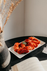 Chicken Wings with hot lava spicy sauce in the plate