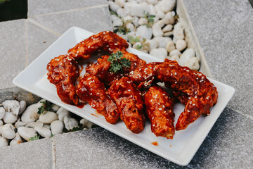 Chicken Wings with hot lava spicy sauce in the plate