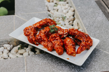 Chicken Wings with hot lava spicy sauce in the plate