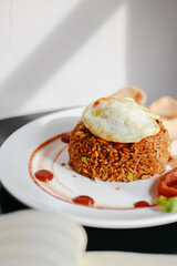 fried rice with sunny egg in the plate