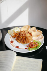 fried rice with sunny egg in the plate