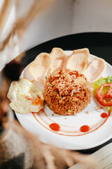 fried rice with sunny egg in the plate