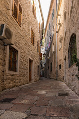Picturesque medieval street in the old town district of the coastal city of Kotor