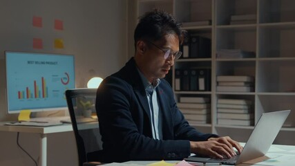 Young professional feeling stressed and frustrated while working late hours in the office, facing mounting pressure and deadlines