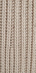Close-up of intricately knitted fabric texture in neutral tones, macro
