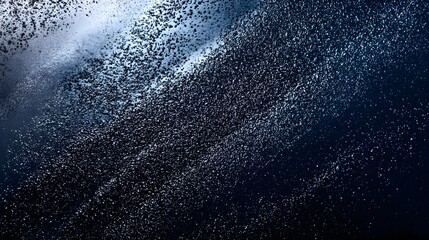 Obraz premium A Detailed Close-up of White Specks on a Deep Blue Background