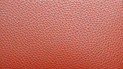 Close-up shot of a luxurious and durable brown leather texture, perfect for background or design element, natural