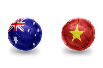 Obraz premium football balls with national flags of vietnam and australia ,soccer teams. on the white background.