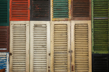 rows of Window Krepyak (jalousie) of various colors. Window consisting of a series of jalousie or blinds arranged horizontally