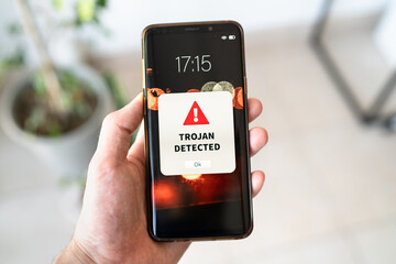 New trojan alert notification on the smart phone. Convept of virus detected.