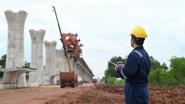 High-Speed Rail Bridge Construction, Engineers at Work on Motorway Construction Site, Planning and Problem Solving, Innovative Technology in Large-Scale Bridge Building