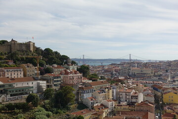 Obraz premium Lisbon, Portugal - July 8 2024 - Lisbon historic center view from the hill
