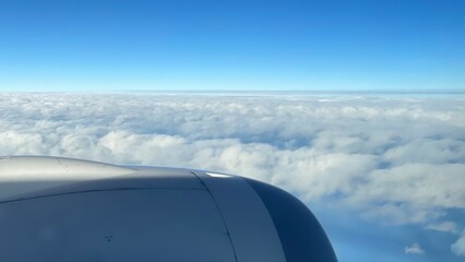 view from airplane window above the sky
