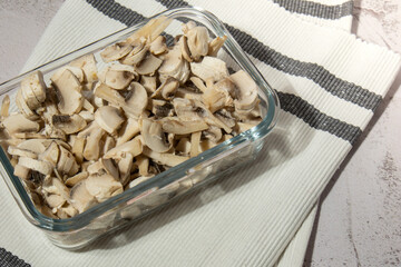 Frozen food sliced mushrooms champignon homemade. Harvesting concept. Stocking up vegetables for winter storage Healthy food, Cooking ingredients