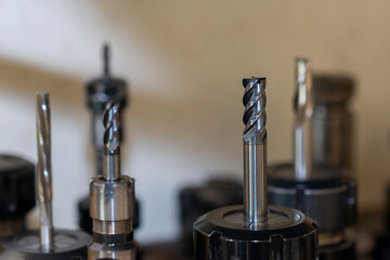 Close-up scene group of the used flat or square solid end mill tools.