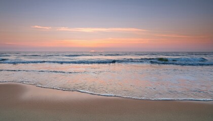 Waves on the beach at red sunset